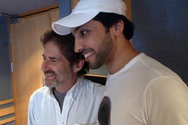 (Left to Right) James Horner with Fahad Al Kubaisi during the recording at Abbey Road Studios in London. Photo Courtesy Seven Media