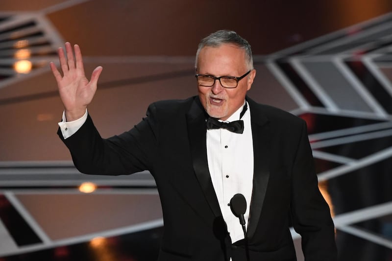 Australian Film Editor Lee Smith accepts the Oscar for Best Film Editing for Dunkirk during the 90th Annual Academy Awards show. Mark Ralston / AFP.