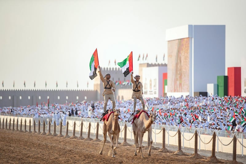 AL WATHBA, ABU DHABI, UNITED ARAB EMIRATES - December 03, 2019: Camel riders participate in the Union March during the Sheikh Zayed Heritage Festival.  

(  Abdullah Al Neyadi for the Ministry of Presidential Affairs )
---