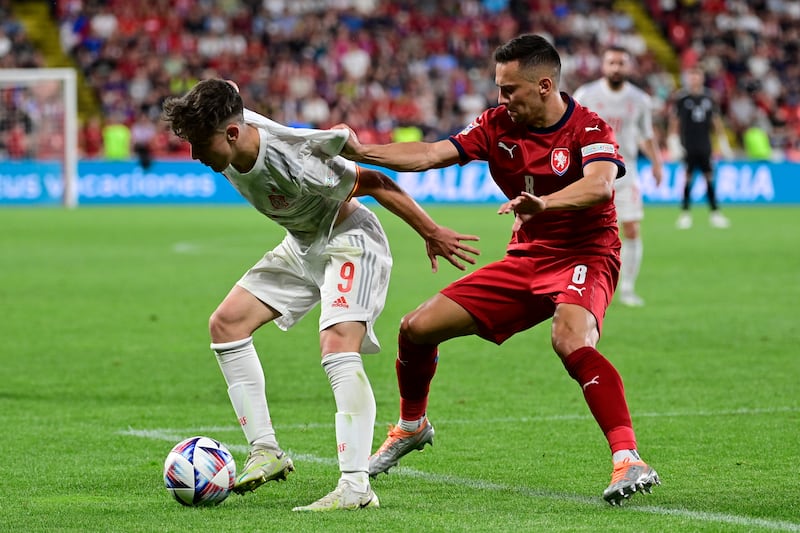 Gavi, left, is challenged by Czech Republic's Jakub Pesek during the Nations League match. AP