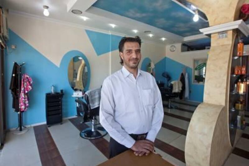 Ras al Khaimah, January 19, 2012 - Abul Hadi Al Zabl is the manager of the Al Taous (the peacock) Salon in Ras al Khaimah City, Ras al Khaimah, January 19, 2012. (Jeff Topping/The National)