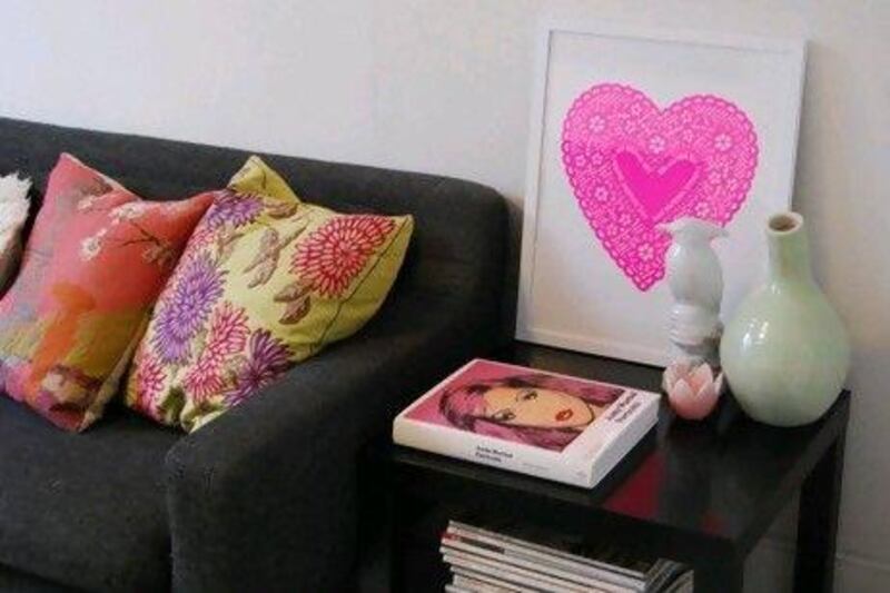Bianca calls her living room a blank canvas filled with colourful accessories, including her pink Life Would be Rubbish Without You heart doily screen-print. Courtesy of Kiss Her by Bianca Hall