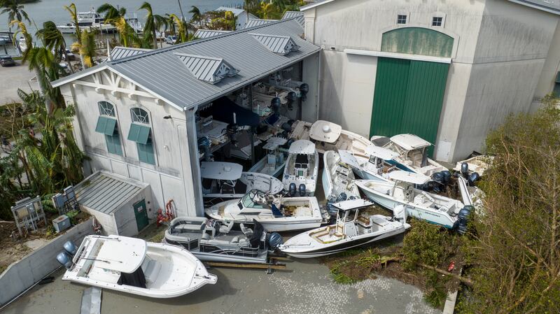 Boats left in a pile at the Port Sanibel Marina Motel by the storm surge. AP