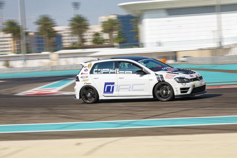 A Golf heads into one of Yas circuit's chicanes.