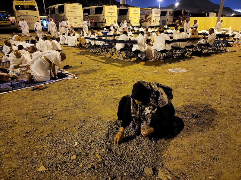 Hajj pilgrims collect pebbles for the stoning of the devil ritual in Muzdalifa, Saudi Arabia. EPA