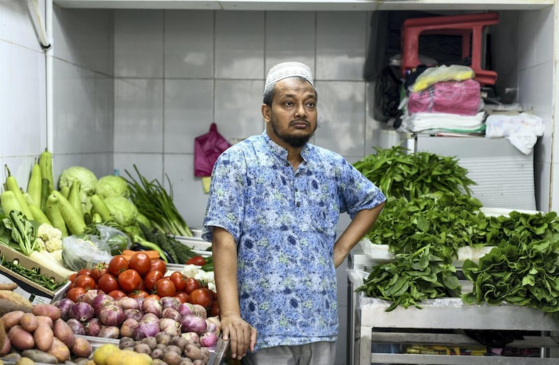 Abu Dhabi, United Arab Emirates - Mohammed Furqan, 47 originally works at a Fruit and vegetable shop in Tourist Club Area. Khushnum Bhandari for The National
