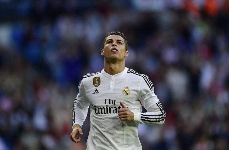 Real Madrid's Cristiano Ronaldo celebrates his third goal against Getafe in his side's La Liga finale on Saturday. Pierre-Philippe Marcou / AFP / May 23, 2015 