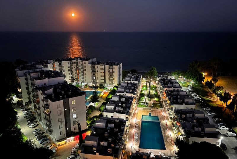 The supermoon rises over the Mediterranean Sea, in the southern coastal city of Mersin, Turkey. AP