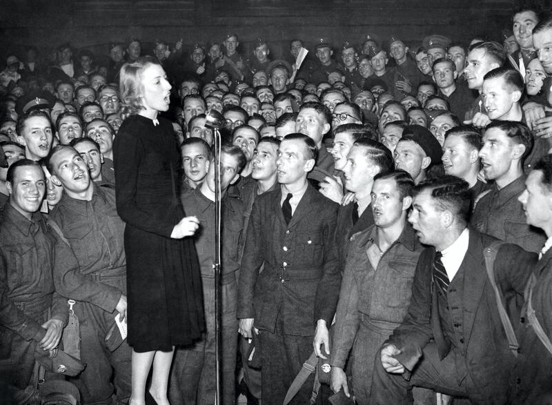 The Services sweetheart Vera Lynn shown here entertaining them at a concert. September 1940 (Photo by WATFORD/Mirrorpix/Mirrorpix via Getty Images)