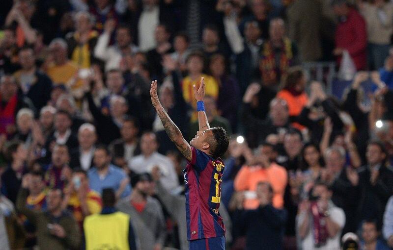 Barcelona's Neymar celebrates after scoring one of his two goals as his side advanced past PSG into the Champions League semi-finals on Tuesday. Josep Lago / AFP