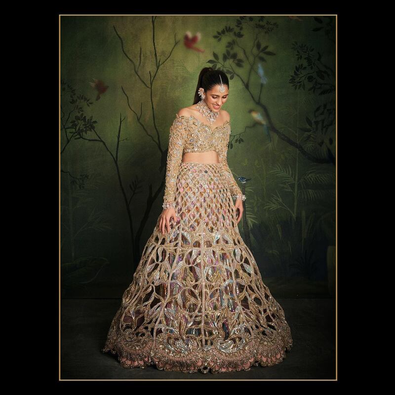 Shloka Mehta, Anant's sister-in-law also dazzled in a custom made lehenga with patterns made in a "cage cutout" style that took 8,000 hours to make. Photo: @manishmalhotra05 / Instagram