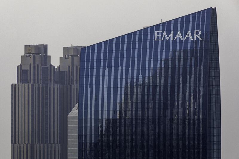 A city skyscraper displays an Emaar Properties PJSC logo in Dubai, United Arab Emirates, on Tuesday, July 23, 2019. Like the rest of the city, the business center has suffered from a prolonged real-estate slump brought on by oversupply and slower economic growth. Photographer: Christopher Pike/Bloomberg