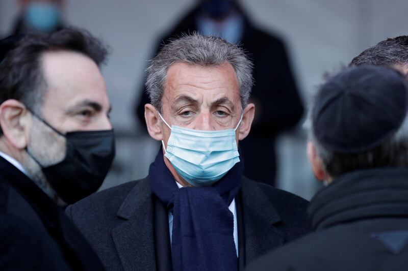 FILE PHOTO: Former French President Nicolas Sarkozy waits before a ceremony paying homage to the victims of terrorism at the Invalides monument in Paris, France March 11, 2021. Thibault Camus/Pool via REUTERS/File Photo