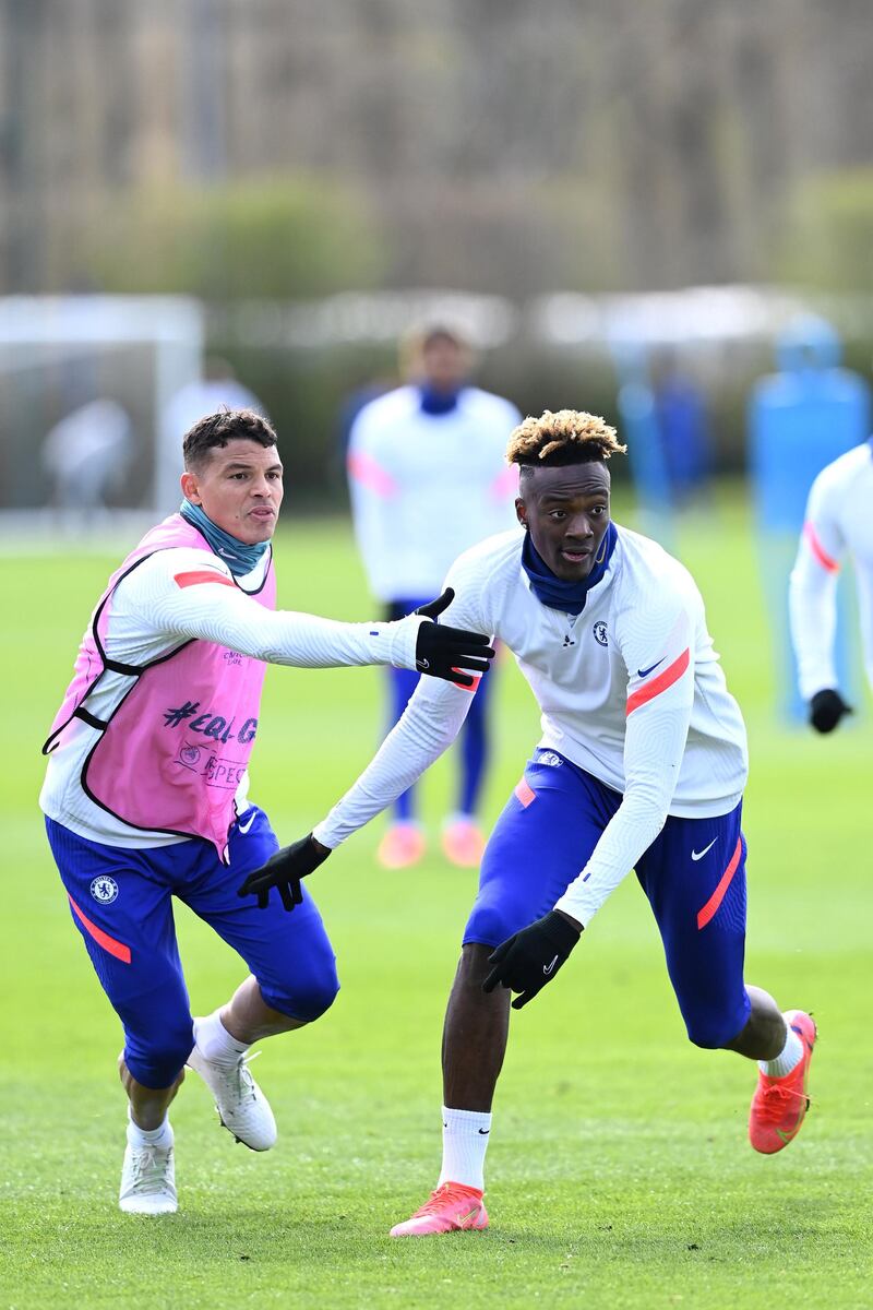 COBHAM, ENGLAND - APRIL 06:  Thiago Silva and Tammy Abraham of Chelsea during a training session at Chelsea Training Ground on April 6, 2021 in Cobham, England. (Photo by Darren Walsh/Chelsea FC via Getty Images)