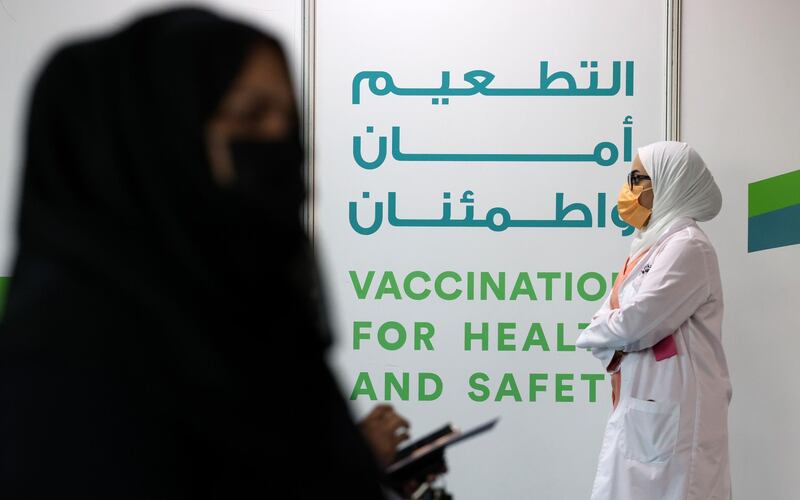 A woman waits for her turn at a vaccination centre 
at Dubai International Financial Centre. AFP