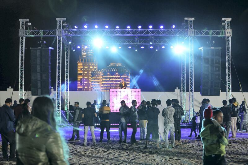 Ras Al Khaimah, United Arab Emirates - Reporter: N/A: A DJ plays at the beach as Ras Al Khaimah puts on a record-breaking fireworks display on New Year's Eve. Tuesday, December 31st, 2019. Al Hamra, Ras Al Khaimah. Chris Whiteoak / The National