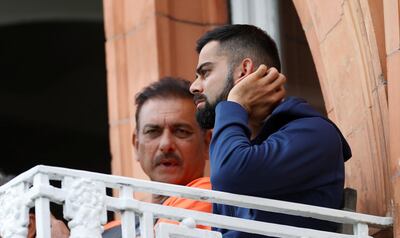 Cricket - England v India - Second Test - Lord’s, London, Britain - August 12, 2018   India head coach Ravi Shastri and Virat Kohli during the match    Action Images via Reuters/Paul Childs