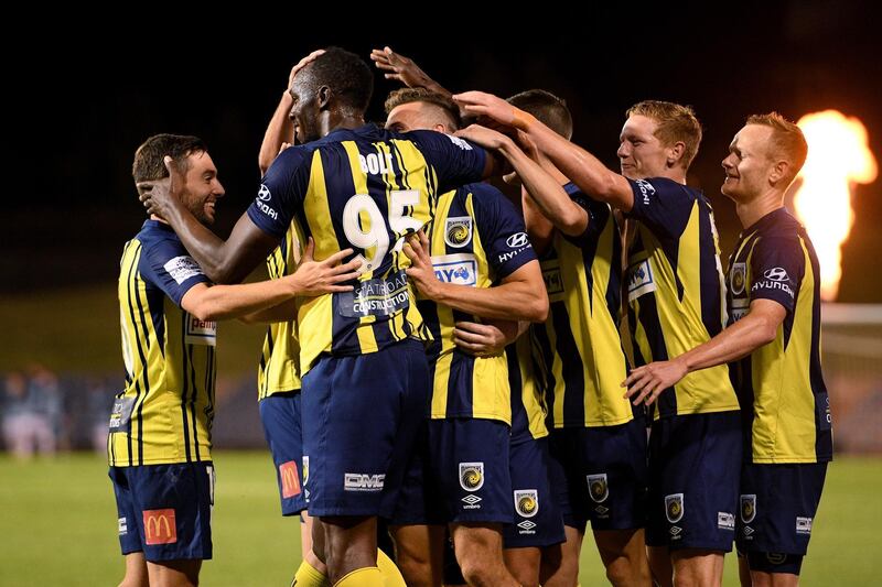 Usain Bolt in action for the Mariners against Macarthur South West United during a pre-season friendly at Campbelltown Sports Stadium in Sydney. EPA