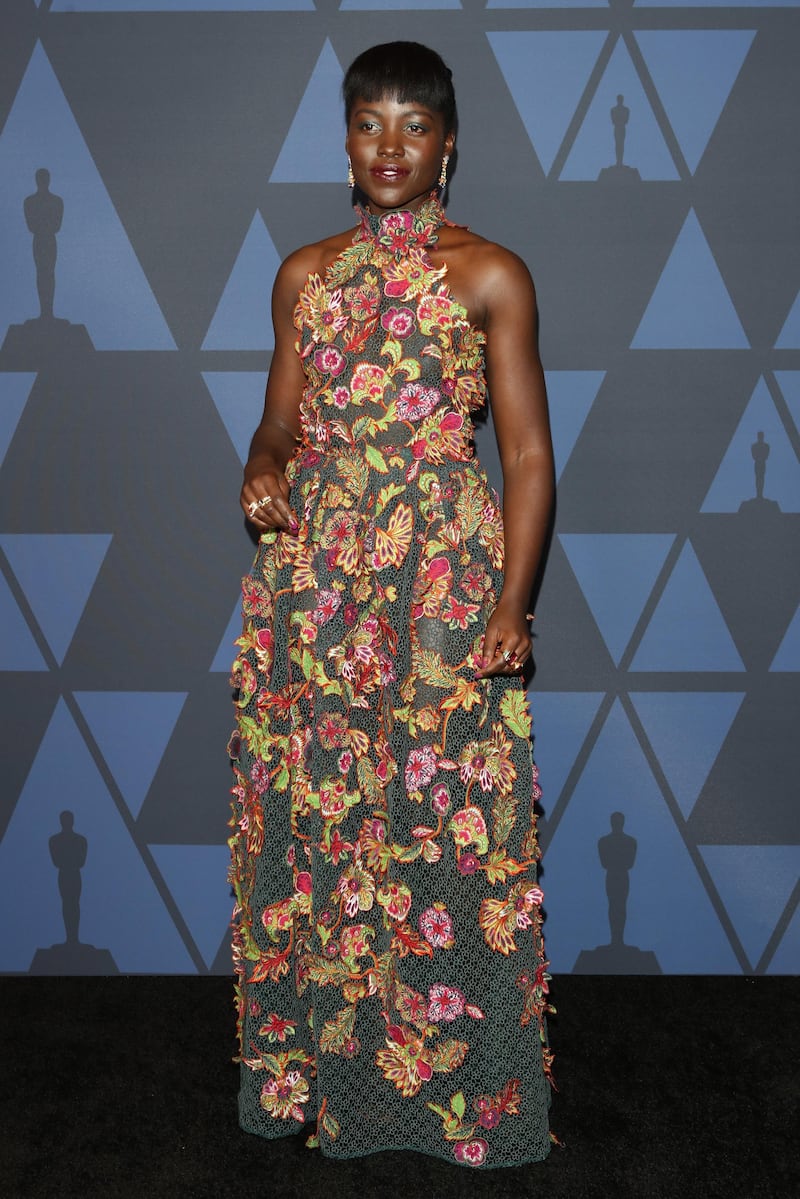 epa07955299 Kenyan-Mexican actress Lupita Nyong'o poses on the red carpet prior the 11th Annual Governors Awards at the Dolby Theater in Hollywood, California, USA, 27 October 2019.  EPA-EFE/NINA PROMMER