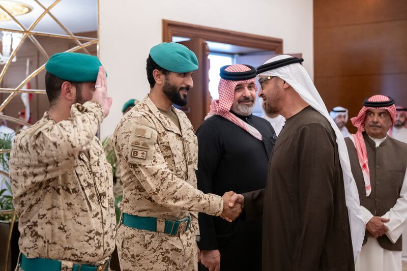 Maj Gen Sheikh Nasser bin Hamad, Representative of His Majesty the King for Humanitarian Work and Youth Affairs and National Security Adviser, bids farewell to Sheikh Mohamed before he leaves Manama. Mohamed Al Hammadi / UAE Presidential Court 