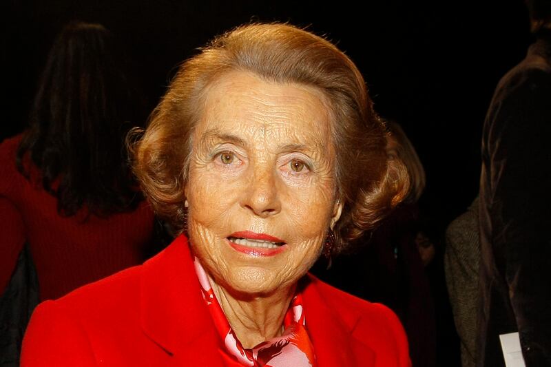 FILE - In this Wednesday Jan. 26, 2011file photo, l'Oreal cosmetics heiress Liliane Bettencourt attends Franck Sorbier's spring/summer 2011 Haute Couture fashion collection, in Paris, Paris. L'Oreal cosmetics heiress Liliane Bettencourt has died at the age of 94 at her home, her family announced.(AP Photo/Jacques Brinon, File)