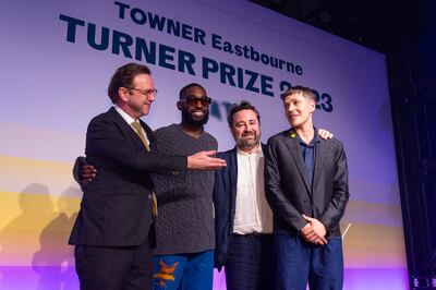 From left: Alex Farquharson, director of Tate Britain, Tinie Tempah, Joe Hill, director of Towner Eastbourne, and Jesse Darling as he is announced as the winner of the 2023 Turner Prize at Eastbourne's Winter Garden. PA Wire