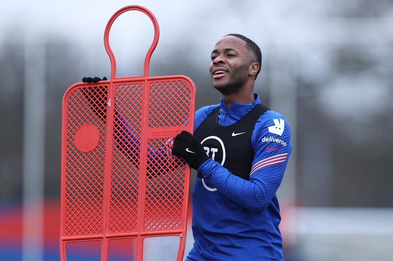 BURTON UPON TRENT, ENGLAND - MARCH 23: Raheem Sterling of England looks on during a training session ahead of an upcoming FIFA World Cup Qatar 2022 Euro Qualifier against San Marino at St George's Park on March 23, 2021 in Burton upon Trent, England. (Photo by Eddie Keogh - The FA/The FA via Getty Images)