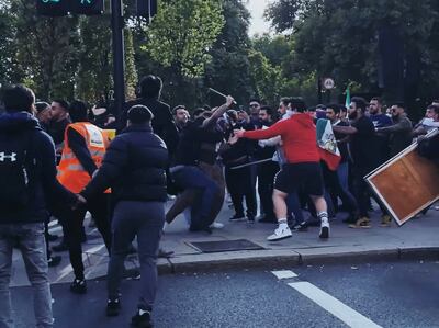 Protesters clash during demonstrations in London following the death of Mahsa Amini in Iran. Twitter @PaulBrown_UK/Reuters