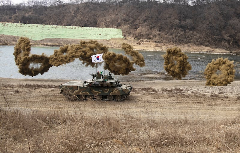 A South Korean tank takes part in a river-crossing exercise during a joint drill with US forces in Yeoncheon, South Korea. EPA