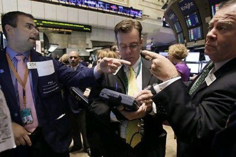 Traders on the floor of the New York Stock Exchange. AP Photo