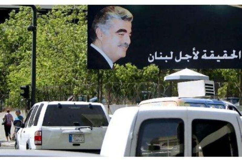 A billboard in Beirut carries a picture of the assassinated Lebanese prime minister Rafiq Hariri with the slogan 'The Truth for Lebanon'.