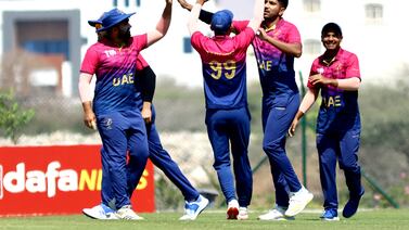 UAE bowler Junaid Siddique, second right, celebrates a wicket in their semi-final victory over Nepal at the ACC Men's Premier Cup. Photo: Subas Humagain for The National
