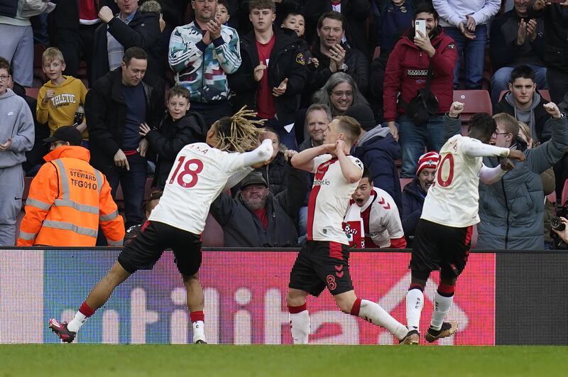 James Ward-Prowse (centre) celebrates scoring Southampton's third goal in the 3-3 Premier League draw with Tottenham at St Mary's on March 18, 2023. PA