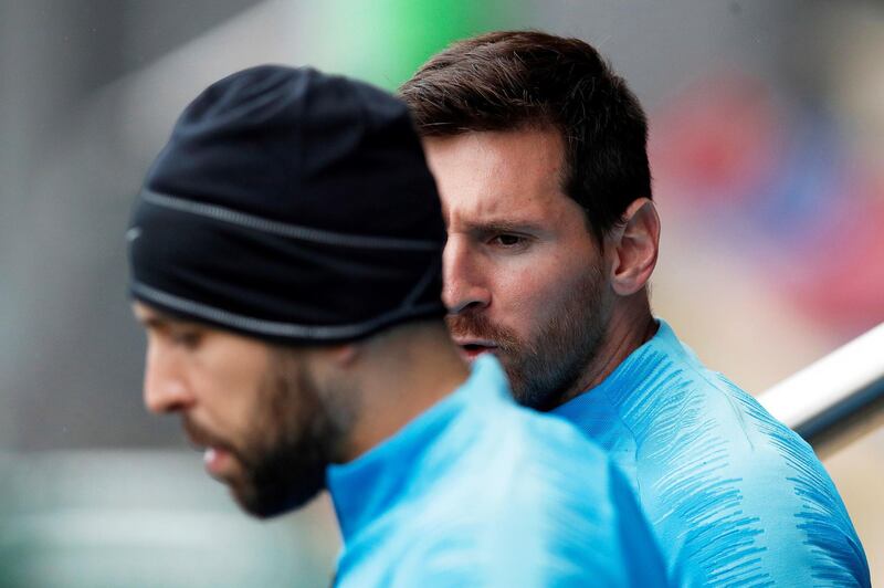 Lionel Messi, right, and Jordi Alba, left. EPA