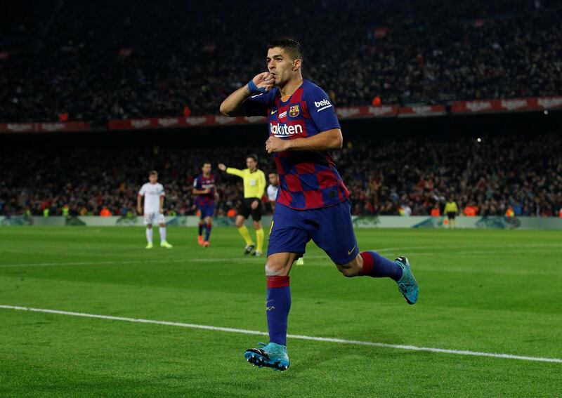 Suarez celebrates after his stunning effort. Reuters