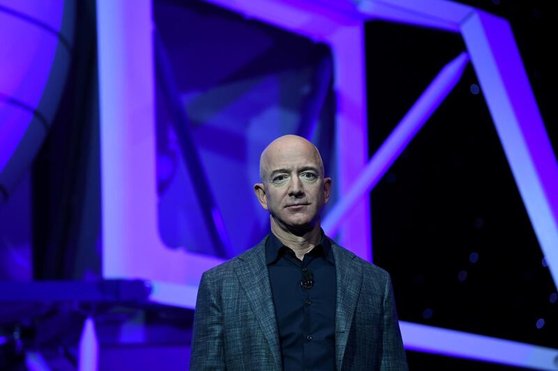 FILE PHOTO: FILE PHOTO: Founder, Chairman, CEO and President of Amazon Jeff Bezos unveils his space company Blue Origin's space exploration lunar lander rocket called Blue Moon during an unveiling event in Washington, U.S., May 9, 2019. REUTERS/Clodagh Kilcoyne/File Photo