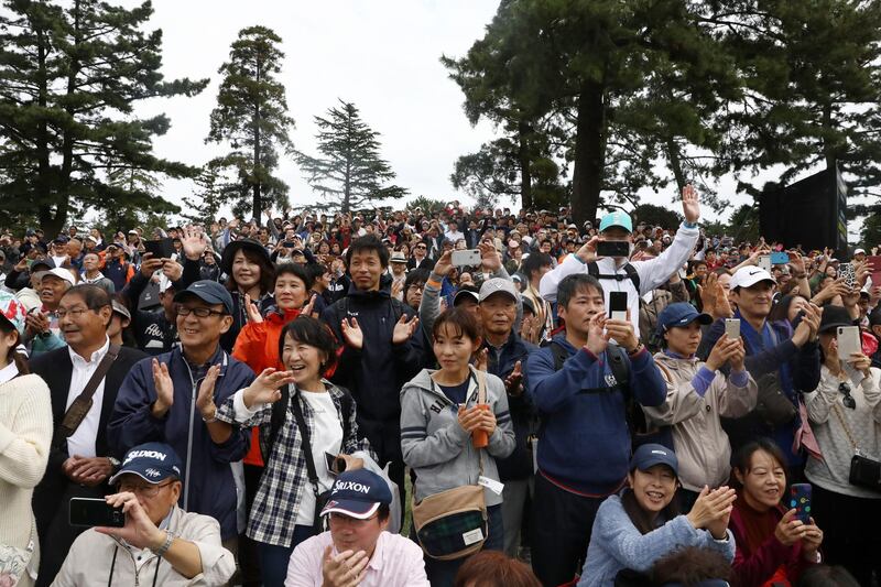 Fans watch Tiger Woods in Japan. Getty