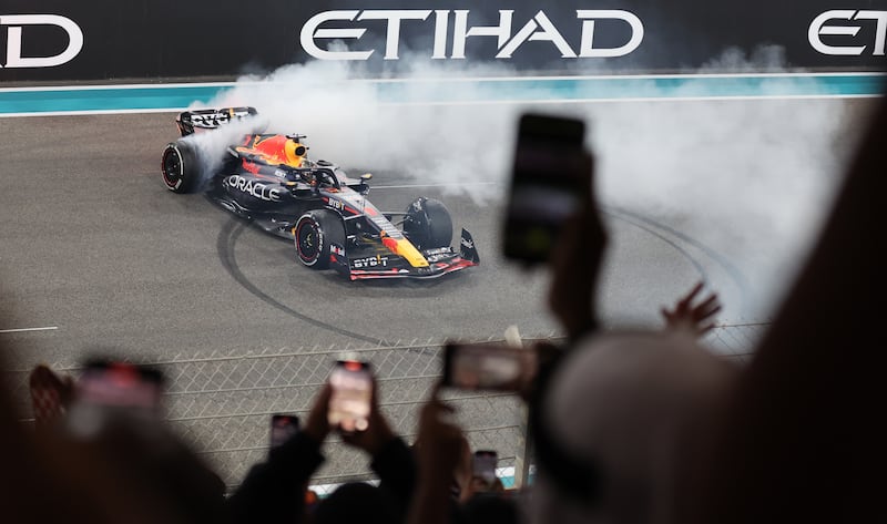 Max Verstappen performs donuts after winning. EPA 