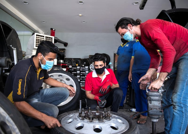 DUBAI, UNITED ARAB EMIRATES. 1 JUNE 2020. Epmloyees at Future Tyres Trading in Al Qouz.(Photo: Reem Mohammed/The National)Reporter:Section: