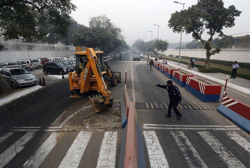 Indian authorities have removed security barriers in front of the US embassy in New Delhi on Tuesday apparently in retaliation for the arrest and alleged heavy-handed treatment of an Indian diplomat in New York. Adnan Abidi / Reuters