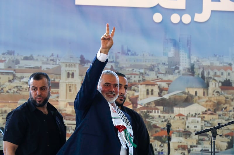 The Palestinian Hamas movement's leader Ismail Haniyeh gives a victory sign after addressing a public rally in the Lebanese city. AFP