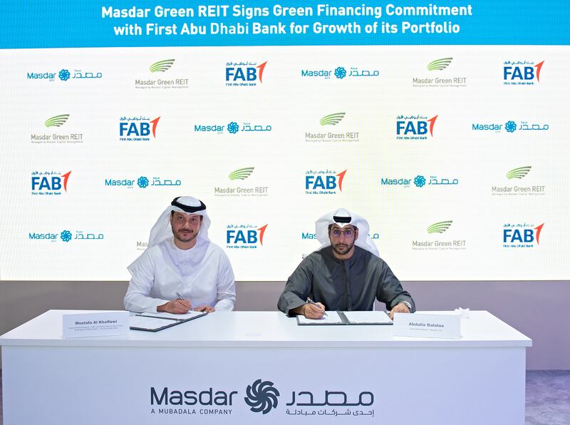 The agreement between Masdar's Green Reit and First Abu Dhabi Bank was announced at the fourth Abu Dhabi Sustainable Finance Forum. Photo: Masdar