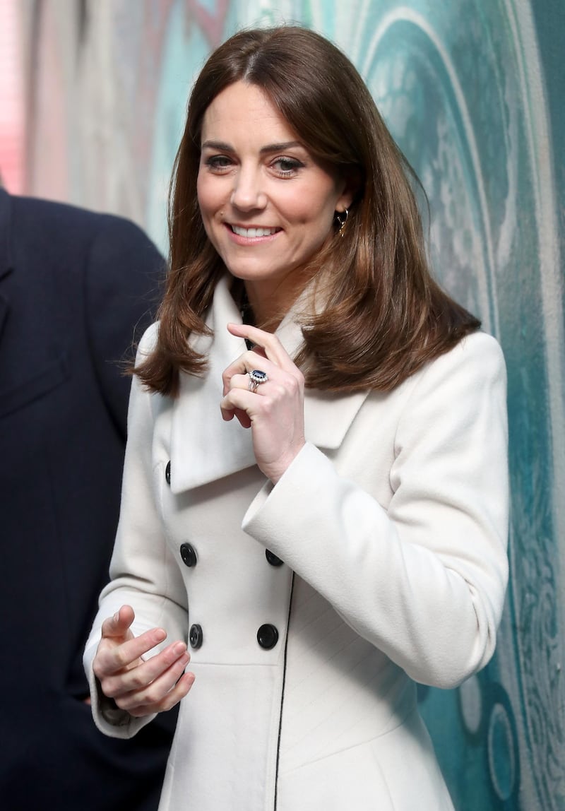 For the visit, the sduchess rewore a Reiss coat she has owned since 2008. Getty Images
