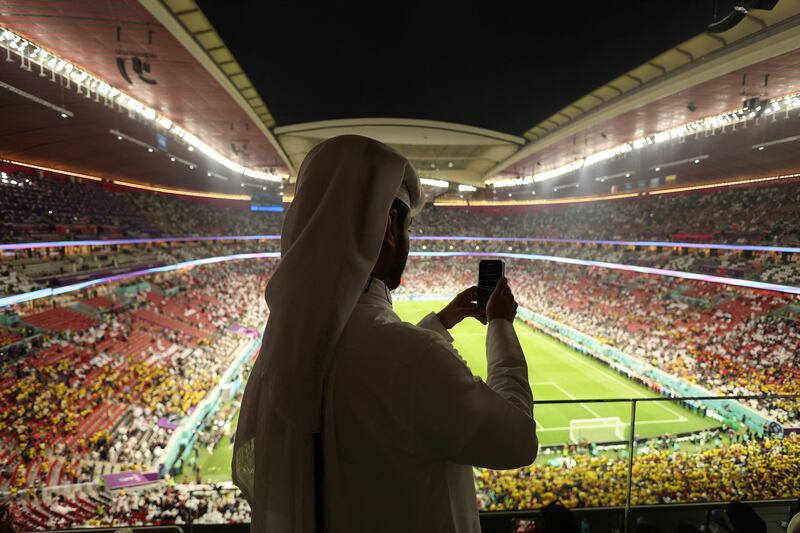 A fan inside the stadium before the match. Reuters