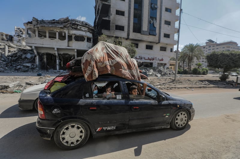 Residents begin to evacuate Gaza city on Friday after an Israeli warning of increased military operations in the Gaza Strip. EPA