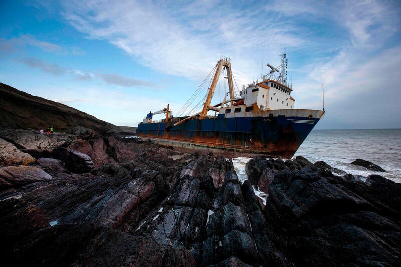 The abandoned cargo ship MV Alta 'ghost ship' is pictured stuck on rocks near the village of Ballycotton south-east of Cork in Southern Ireland.  AFP