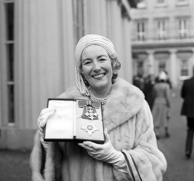 In this Dec 2, 1975 photo, singer Vera Lynn is seen outside the Buckingham Palace after being invested 'Dame Commander of the British Empire'. AP