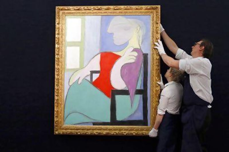 Picasso's Femme Assise on auction in London. Suzanne Plunkett / Reuters