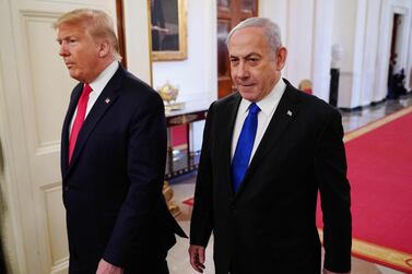US President Donald Trump and Israeli Prime Minister Benjamin Netanyahu arrive for an announcement of Trump's Middle East peace plan in the East Room of the White House in Washington, DC on January 28, 2020. / AFP / MANDEL NGAN
