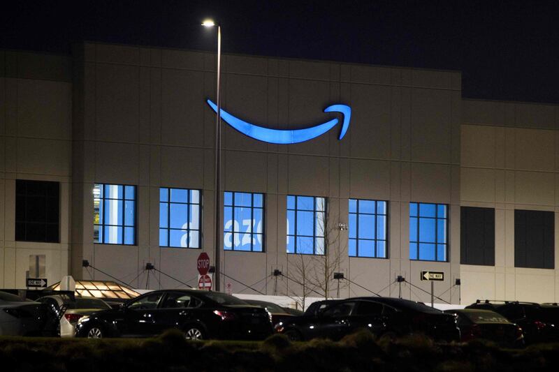 (FILES) In this file photo taken on March 27, 2021 (FILES) In this file photo, the Amazon  fulfillment in Bessemer, Alabama. A contentious unionization drive at an Amazon warehouse in Alabama failed as a vote count on April 9, 2021, showed a wide majority of workers rejecting the move. In a vote count seen online, National Labor Relations Board officials counted more than 1,608 "no" votes shortly before 1500 GMT, representing a majority of the 3,215 ballots cast. Slightly more than 600 votes favored the unionization effort organized by the Retail, Wholesale and Department Store Union. / AFP / Patrick T. FALLON

